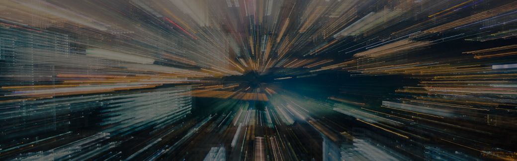 Zoomed in city lights creates a streaked effect.