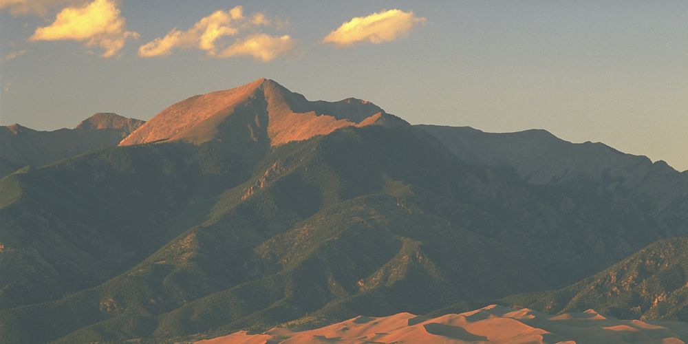 Large, orange-red sand dunes.