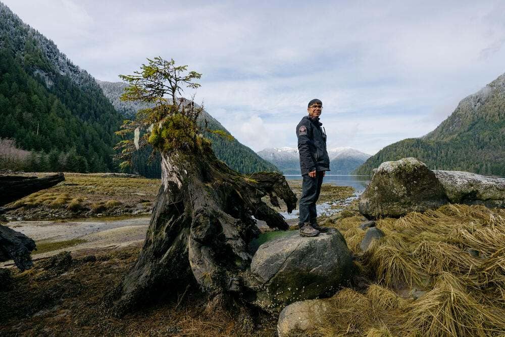 Portrait of Blair Hans, a part of the Nuxalk Guardian Watchman, on the Kwatna Estuary near the town of Bella Coola, on the central coast of British Columbia, Canada.