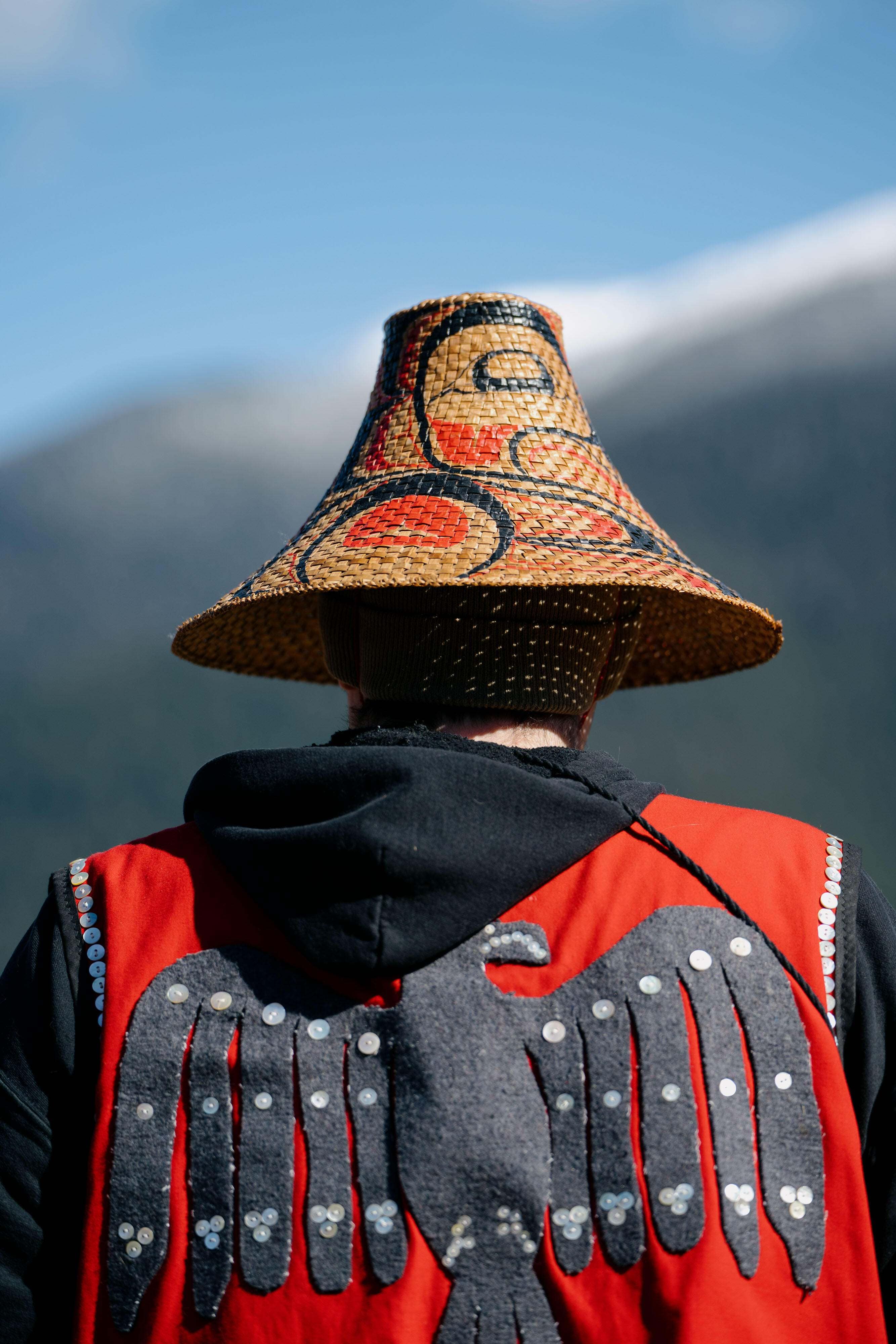Nuxalk culturekeeper Snxakila Clyde Tallio at the sputc (eulachon) ceremony on banks of the Bella Coola River, in the town of Bella Coola, on the central coast of  British Columbia, Canada.